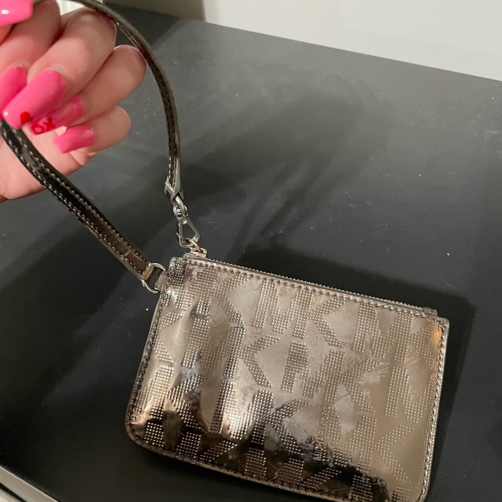 Nickel metallic Michael Kors wristlet/wallet
